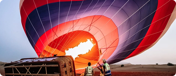 Balloon inflating at dawn
